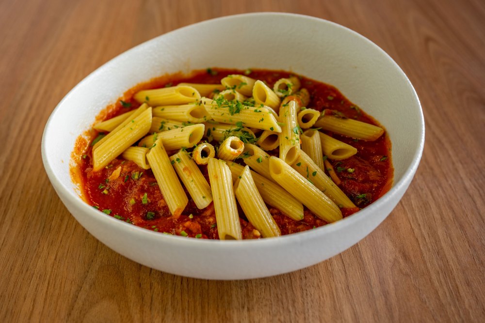 Illustrative penne pasta in tomato sauce